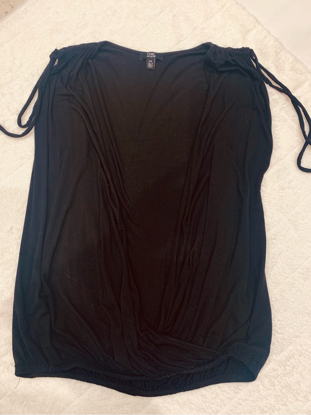 Plunge neck line Black Tie-Shoulder Tank Top - front is open down to the waist.